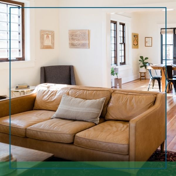 living room with dining room in background