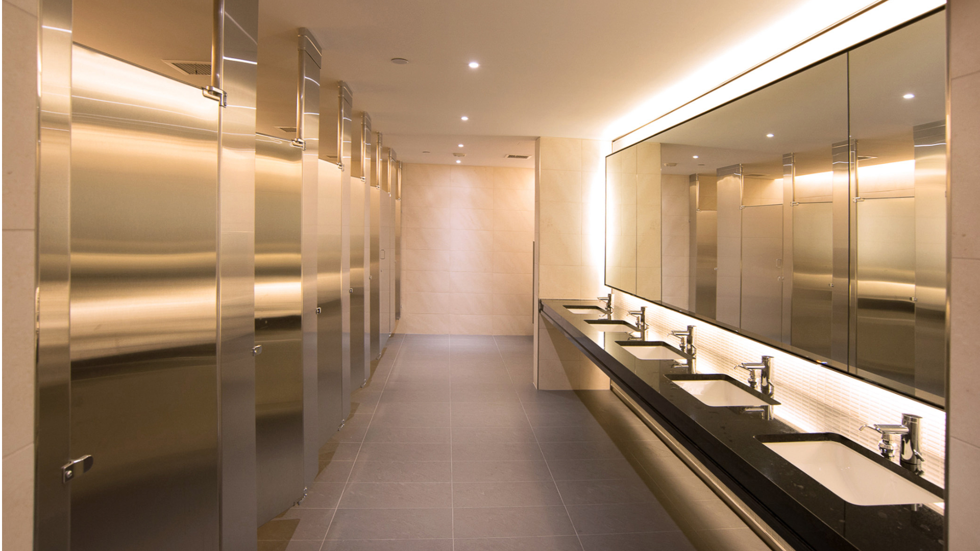 Office bathroom after a deep cleaning, sanitized and ready to be used